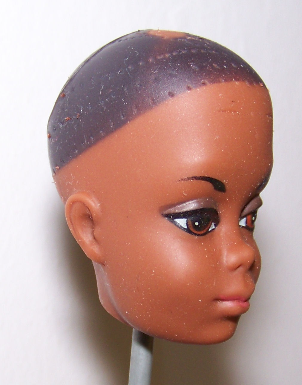 bald black barbie